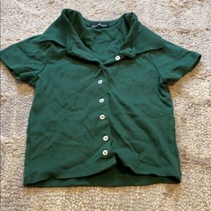 never worn, dark green button up t shirt sleeve
